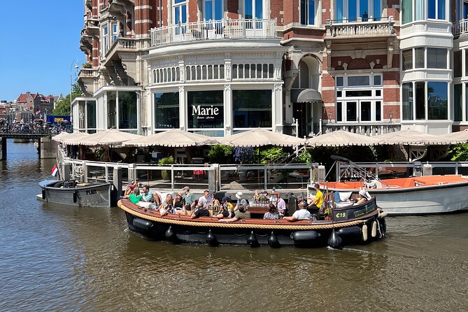 Amsterdam Luxury Boutique Boat tour with Unlimited Beer and Wine - The sights you’ll pass: De Wallen, Rembrandt, Oude Kerk, and the Skinny Bridge