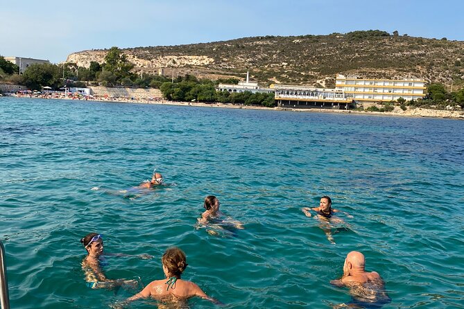 Boat Tour to Sella del Diavolo: Snorkeling, GoPro & Beer - Poetto Beach: the crowd magnet with a salt-making past