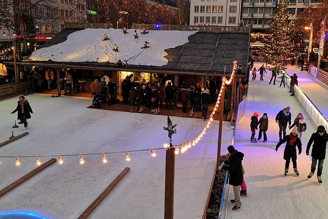 Cologne Christmas Market and Kölsch Beer Small-Group Tour - Heinzels Wintermarchen on Heumarkt and Alter Markt: the hour that feels like a show