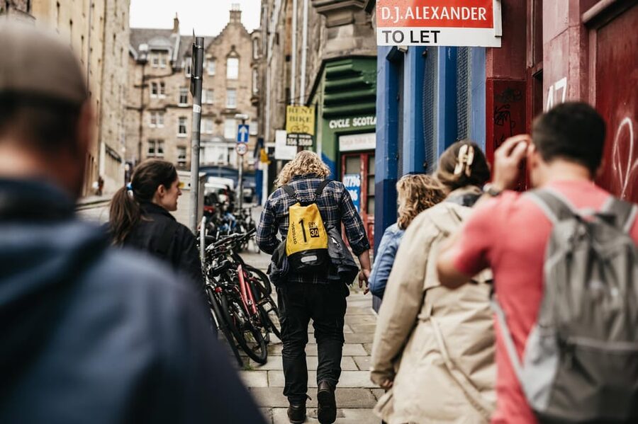 Edinburgh: Pubs and History Guided Walking Tour with Beer - Canongate: the longer stop where food and whiskey enter the picture