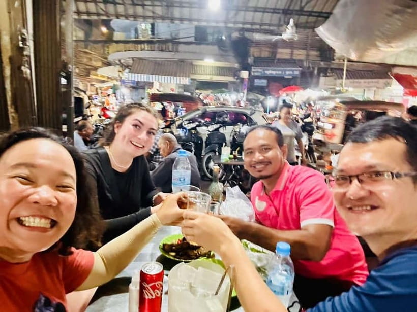 Phnom Penh: Street Art and Food Tour with Pickup and Beer - Cambodian food tasting: Banh Cheav, Nom Krouk, and Lot Cha made fresh