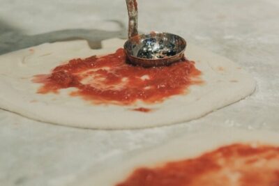 Pizza and Gelato | Cooking Experience in Garbatella (Draft Beer!) - Pizza making party: rolling dough, topping your way, and baking
