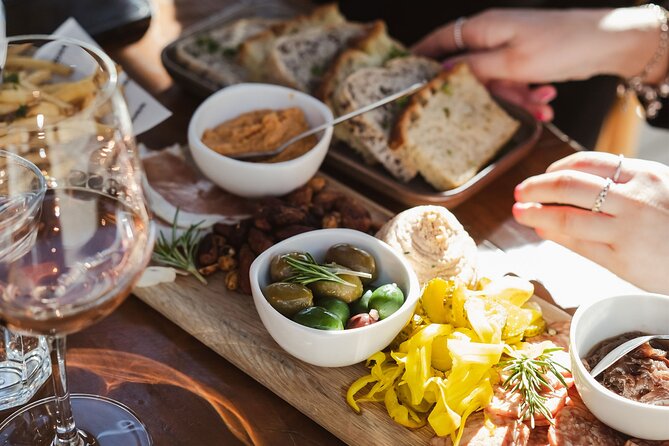 Queenstown: Afternoon Wine & Beer Tour with Platters - Entering Queenstown’s Gibbston wine world without the car drama