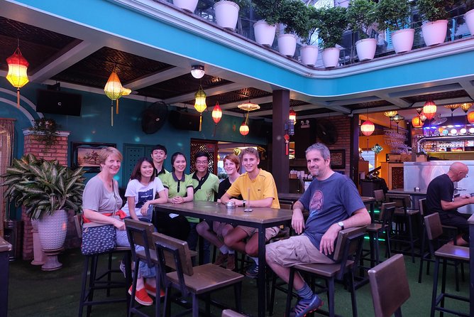 Saigon Night Craft Beer and Street Food By Scooter and motorbike - Stop 1: Rooftop sunset beer and snack to start your evening