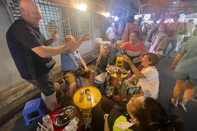 Saigon Night Craft Beer and Street Food By Scooter and motorbike - Stop 4: Local pub dinner with sprouting egg, fried beef tendon, and Frozen Beer
