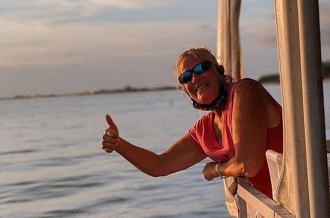 Scenic Sunset Cruise from Historic Johns Pass, Free Beer and Wine - Sunset views, music, and how the captain helps with dolphins