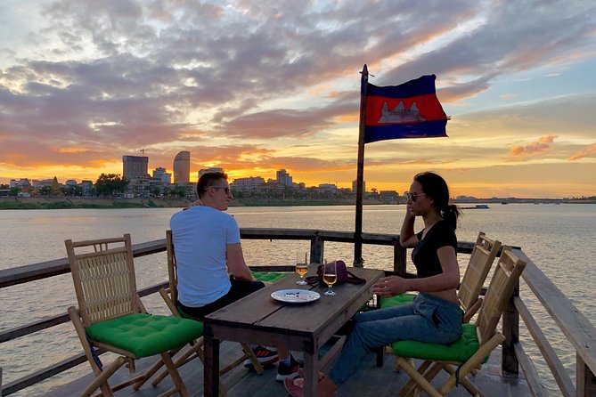 Sunset Cruise with unlimited beer & soft drinks -English speaking guide on board - A 90-minute Phnom Penh sunset cruise with real river scenery