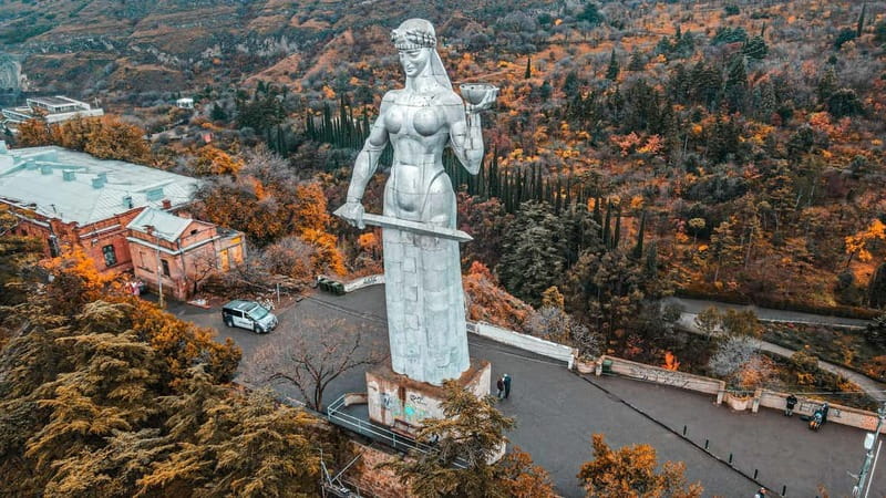 Tbilisi: Sightseeing Tour, Wine or Beer Tasting, & Cable Car - Peace Bridge, Rike Park, and the river-crossing mindset
