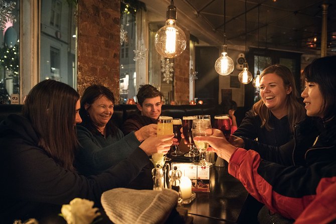 Vesterbro Tour With Beer & Pub Visits - Max 10 People - Stop 1: Copenhagen Central Station gates and neighborhood identity